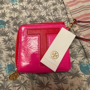 Tori Burch wristlet. Pink and Red with the letter T